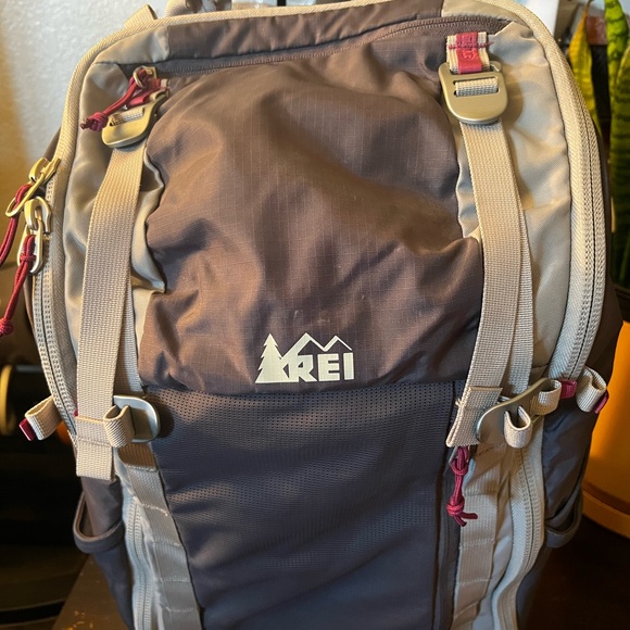 REI Handbags - REI Gray and Purple Backpack with Modern Design and Durable Material
